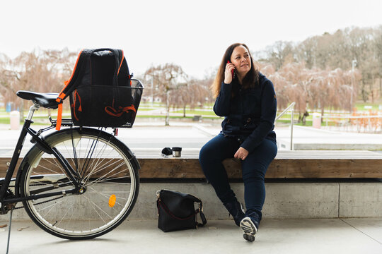 Senior woman having a call - Powered by Adobe