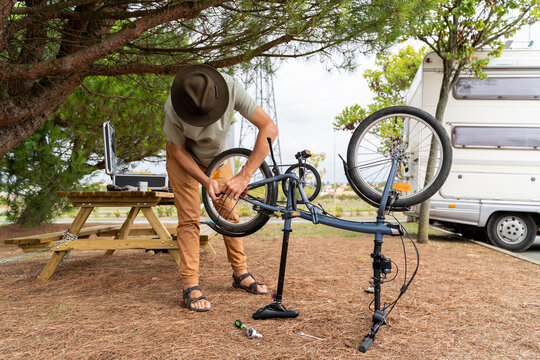 Man repair bike tire