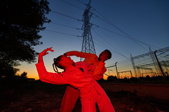 Happy man and woman in evening