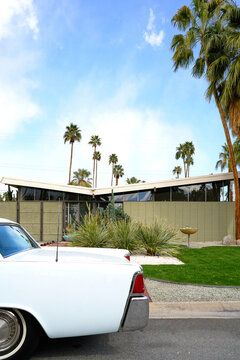 Classic Mid Century Modern home with vintage car