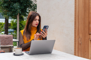 Remote work laptop and phone