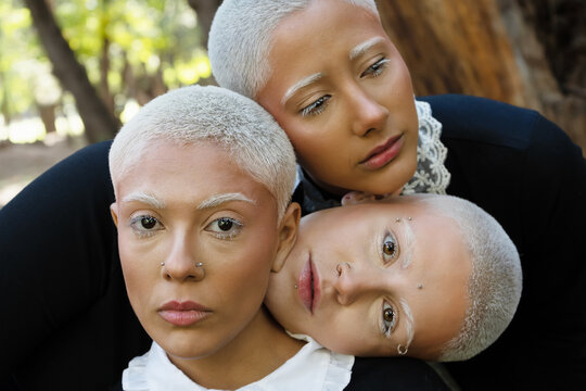 The Gothic Trio: Three Women with Unique Style and Edgy Hair