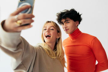 Two Teenage Friends Taking Selfie Photo