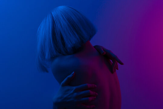 Neon Girl, night time.