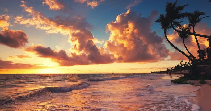 Sunrise with scenic cloudscape of paradise exotic island beach and tropical caribbean sea 4K cinematic video