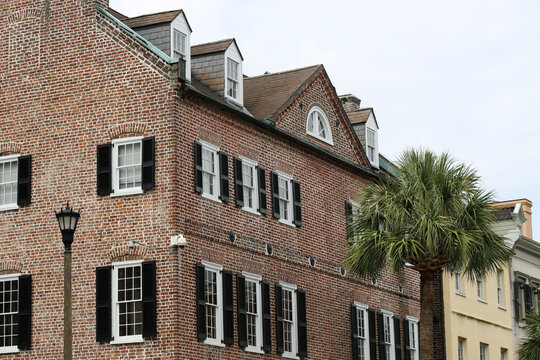 A Classic Brick Row House In Charleston, South Carolina. 