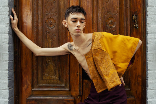 City Slicker: Capturing a Young Man's Stylish Outfit on the Streets