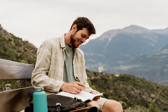 Man write on notebook