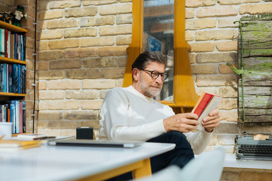 Senior Man Reading Book