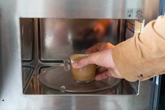 heating coffee inside Microwave