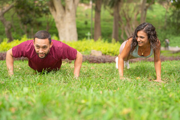 Friends doing plank competition