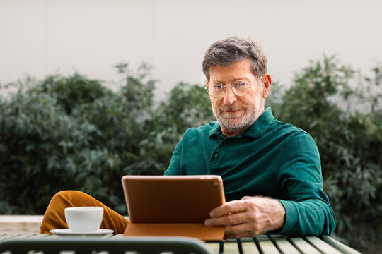 Man Using Digital Tablet at Home