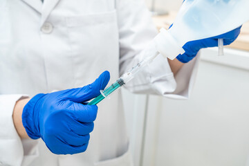 doctor getting ready for injecting hair and scalp treatment