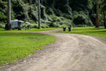 Bins at a campground. Efficient Waste Management System with Wheelie Bins at a Picturesque Camping Site in NSW National Park, Australia