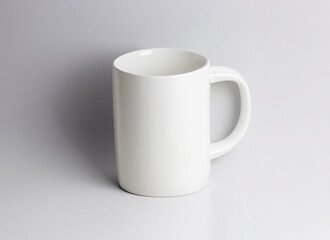 A Close-Up Shot of A Plain White Coffee Mug Mock-up with Softbox Lighting