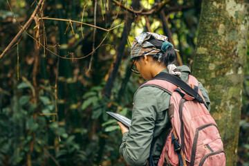 Girl biologist in the jungle