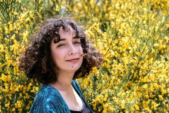 In front of the broom