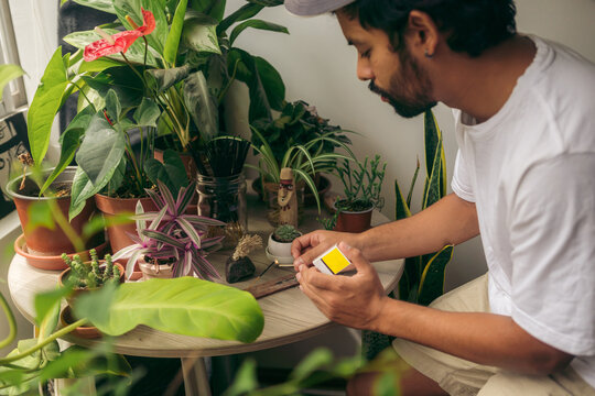 Man lighting an incense