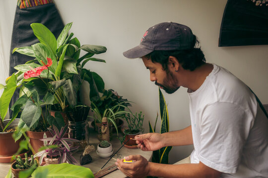 Man lighting an incense
