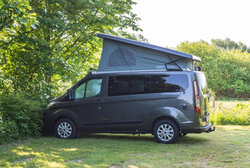 camper van on the background of the nature