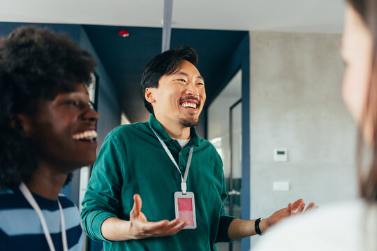 People Talking in Office, Working Together  - Powered by Adobe