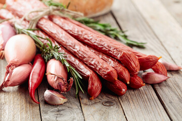 Smocked sausages with onion, garlic, pepper, and rosemary.