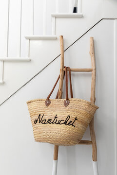 Handbag with Nantucket name in minimalist home interior 