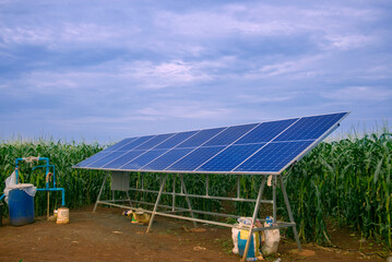 Solar panels for irrigation systems in farmer's corn fields in countryside of thailand