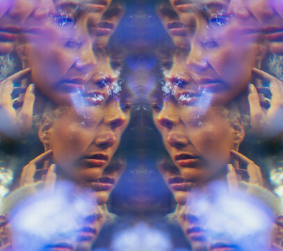 Experimental portrait of young woman through the prism