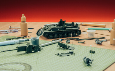 Assembling scale model of tank