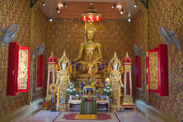 The presiding sitting Buddha enshrined in the church for tourists to pay homage to the Buddha...