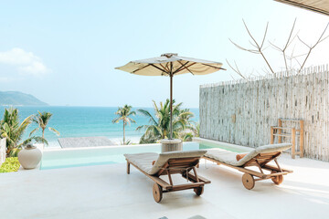 Chaise lounge umbrella and private swimming pool
