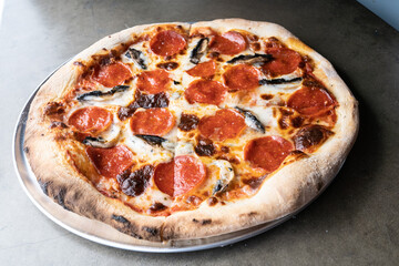 Classic Pepperoni, Mushroom, and Melty Cheese Pizza