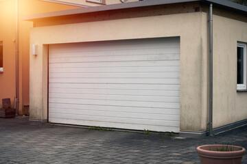 Garage door. Luxury and modern house with double garage door in Europe.
