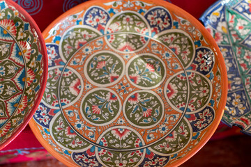 orange ceramic plate and and it patterns