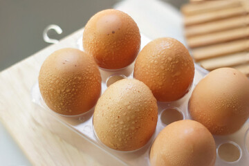 Fresh Eggs with water drops shinning Soft natural lights , Healthy Food concept background