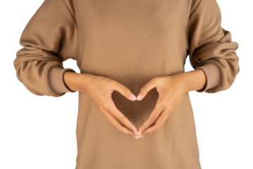 Gesture of two hands forming a heart in the stomach