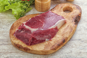 Raw rib-eye beef steak black angus