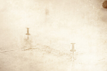 Background for travel concept. An old sheet of paper with a map silhouette with a compass and...