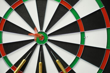 Darts. The dart for playing in the game board is stuck. Hit the sector in darts. The concept of a...