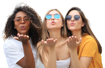 Three beauty women wearing summer clothes posing togeher and looking at the camera, sending kiss on a transparent background.