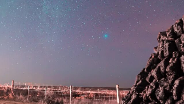 Time lapse of a peat stack on a moonlit night. The stars are visible and the clouds blow past in the background. Filmed on the Isle of Lewis, part of the Outer Hebrides of Scotland.