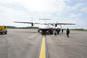 Naklejka premium Aircraft Carrying Important Officials in Indonesia's sovereignty