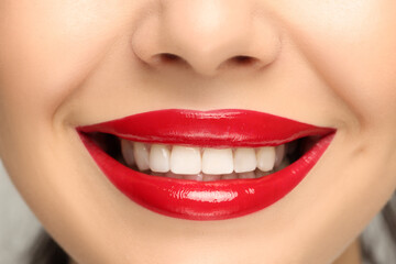 Fototapeta premium Smiling woman with healthy teeth, closeup view