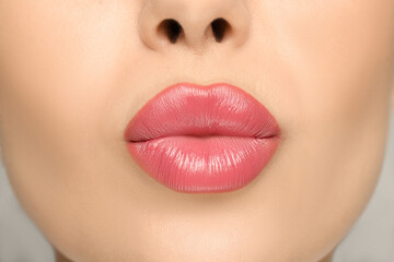 Obraz premium Closeup view of woman with glossy lipstick