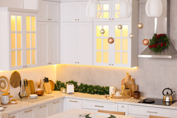 Stylish kitchen decorated for Christmas. Interior design