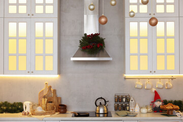 Cozy spacious kitchen decorated for Christmas. Interior design