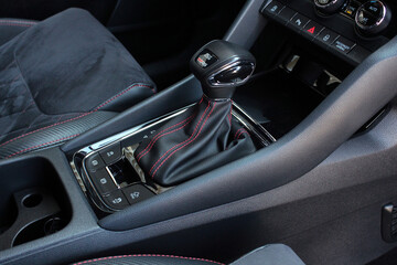 Automatic gearbox shift lever. Close up of the automatic transmission shift lever with luxury.