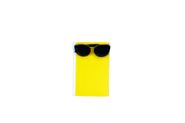 Yellow book and sunglasses.  Isolate. Top view flat. Available PNG
