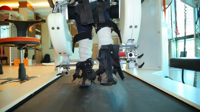Medical robot. Hocoma medical walking robot. The medical walking robot is used in the treatment of the consequences of a stroke and cerebral palsy.
